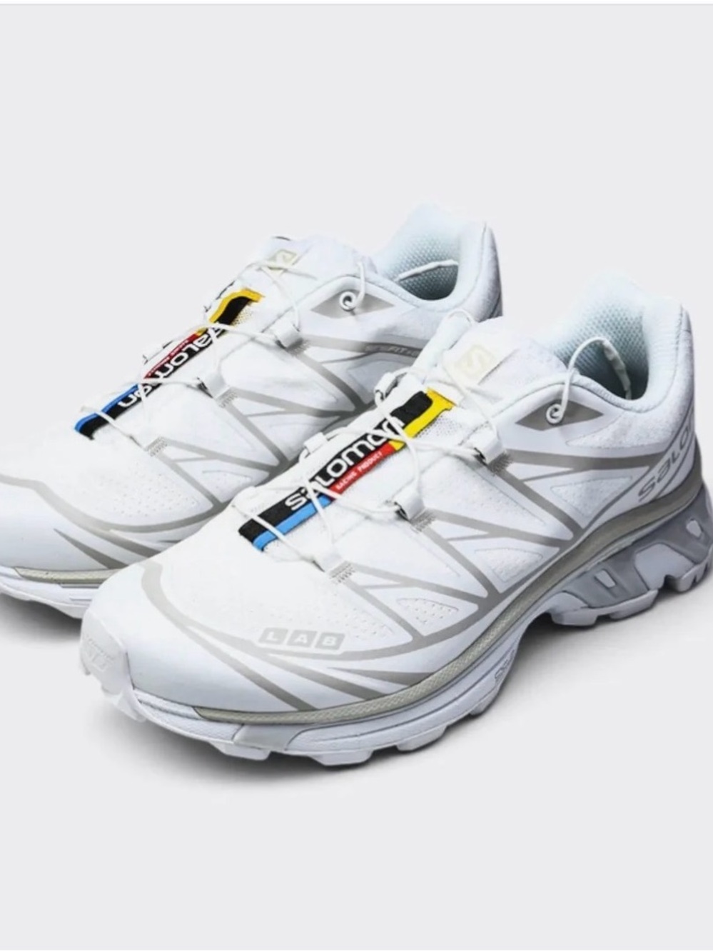 Salomon White Athletic Sneakers with Accent Stripes
